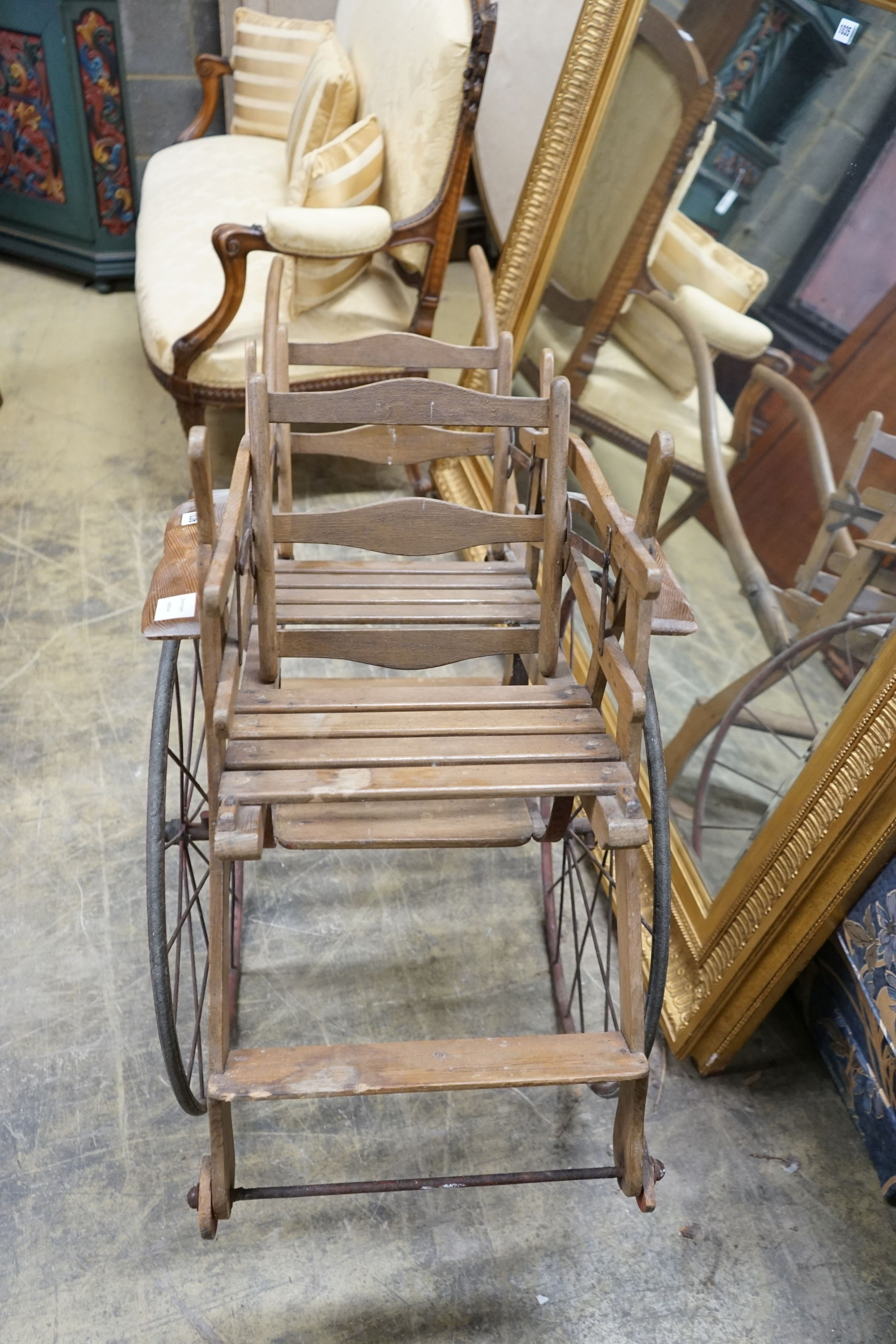 A small oak and pine twin seat cart, width 48cm, length 150cm